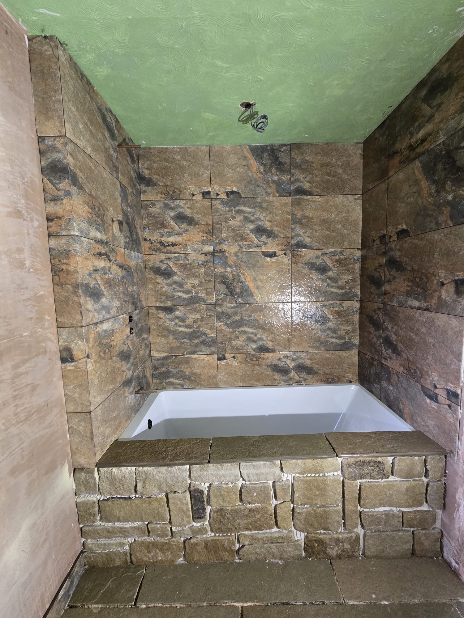 Stone bathroom tiling project by D&S Tiling Service